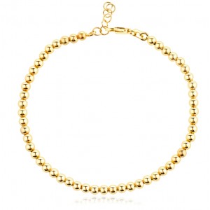 Златна гривна с топчета