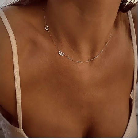 Златно колие с две букви