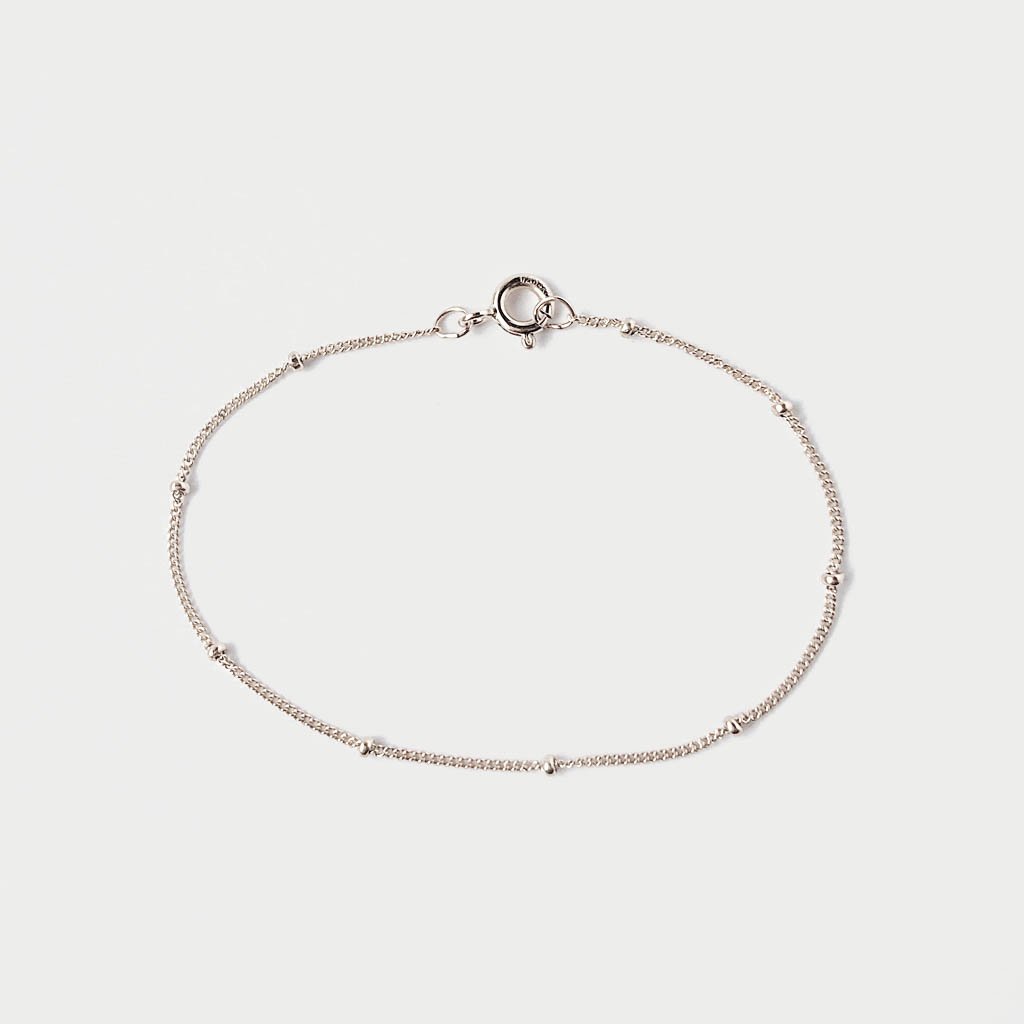 Златна гривна 14 карата с Полирани Топчета 