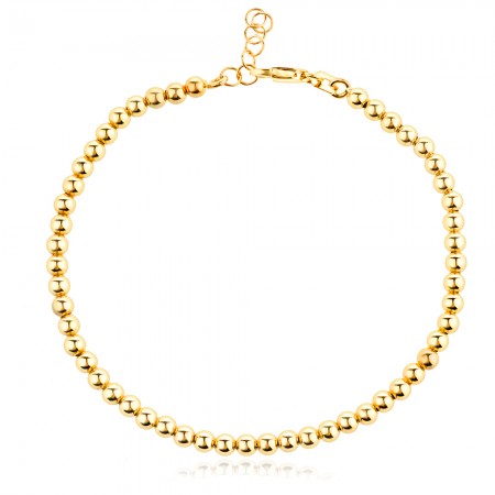 Златна гривна с топчета